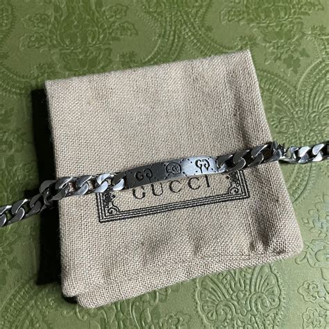 gucci ghost chain bracelet.